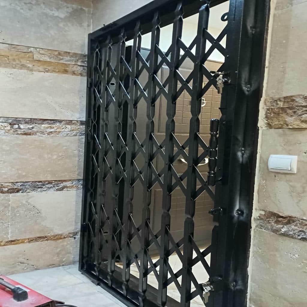 خرید درب آکاردئونی ساختمان ضدزنگ در اصفهان