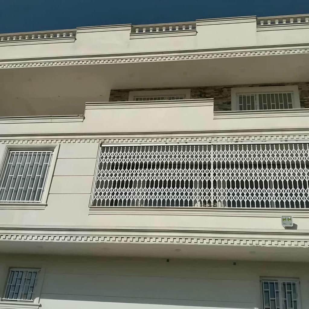 قیمت درب آکاردئونی ساختمان ورودی آپارتمان در بندر انزلی