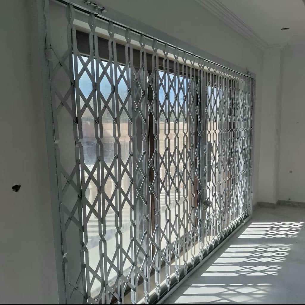 نصب درب آکاردئونی ساختمان حرکت نرم در بابل