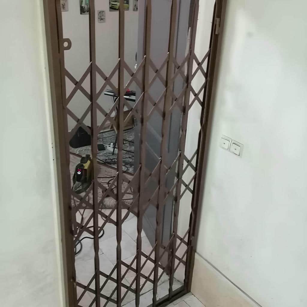 نصب درب آکاردئونی ساختمان حرکت نرم در رفسنجان