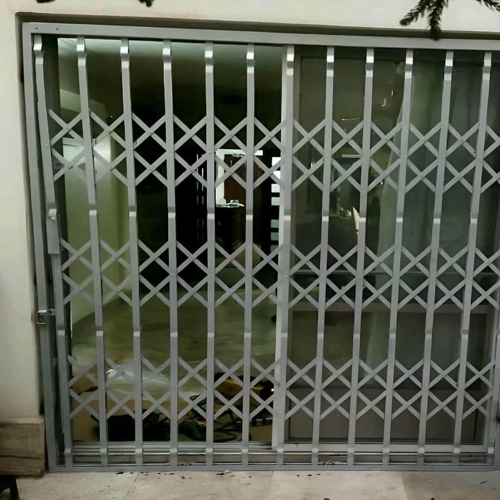 قیمت درب آکاردئونی ساختمان ورودی مغازه در آبادان
