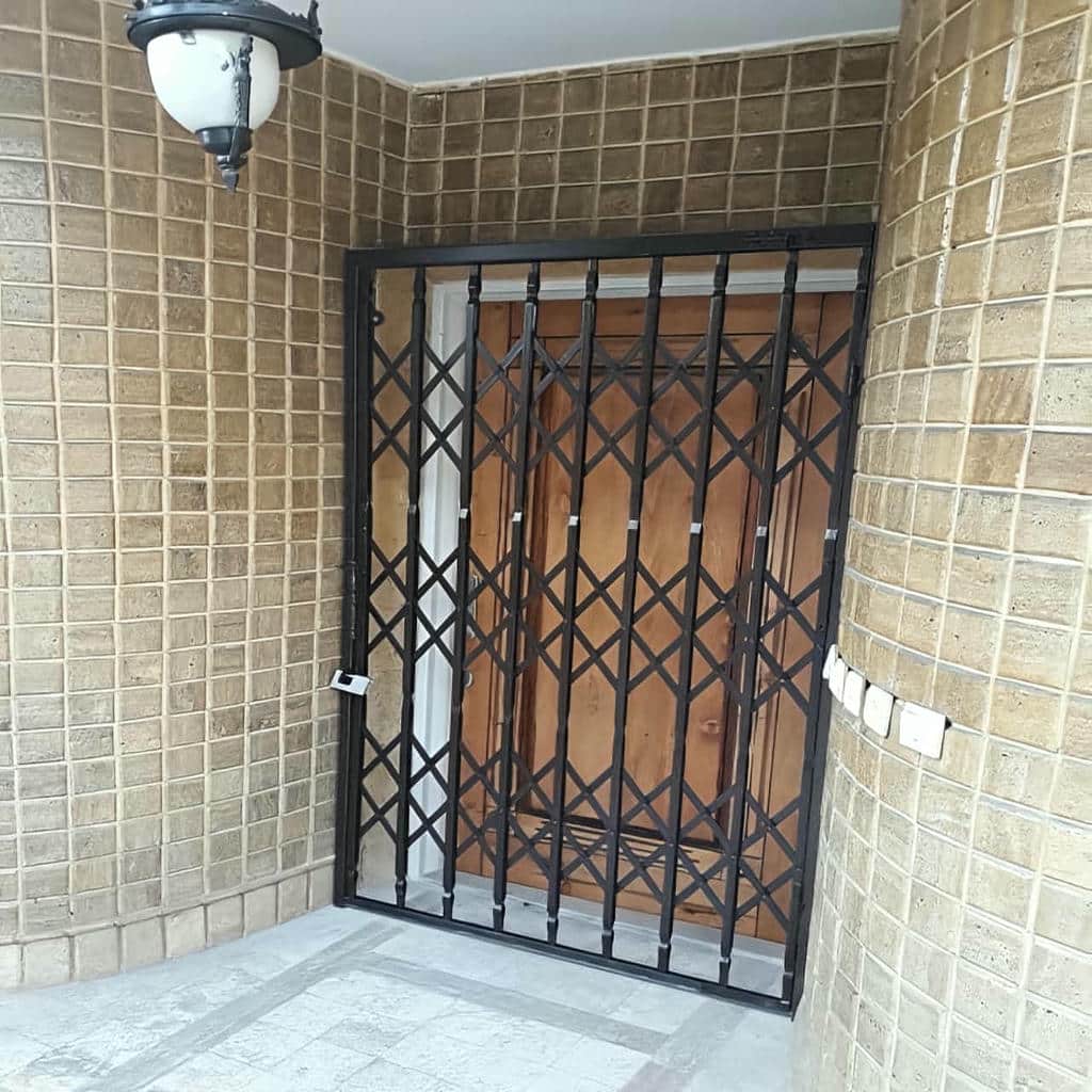 نصب درب آکاردئونی ساختمان رنگ صنعتی در محمدشهر